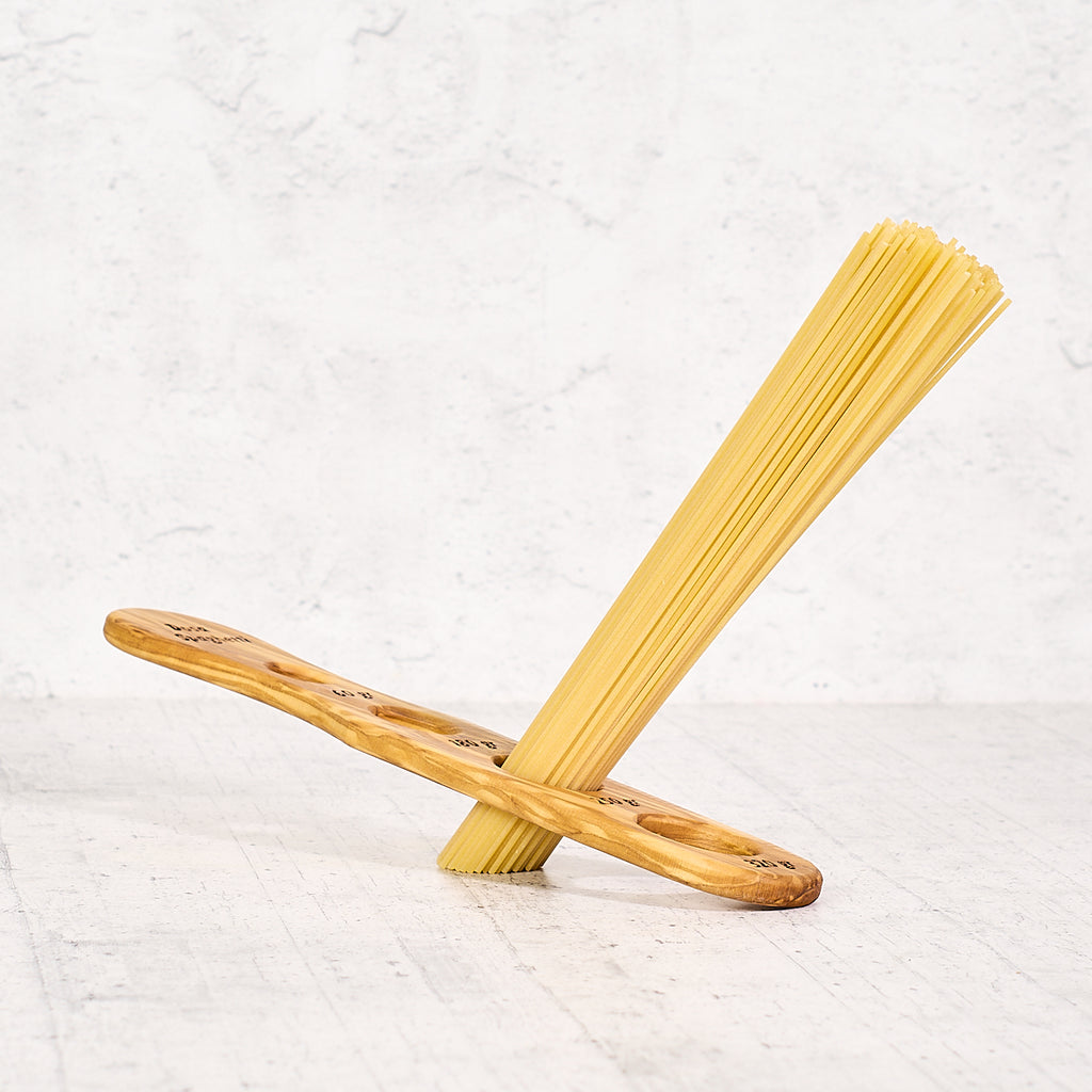 Dosa spaghetti "4 fori" in legno di olivo