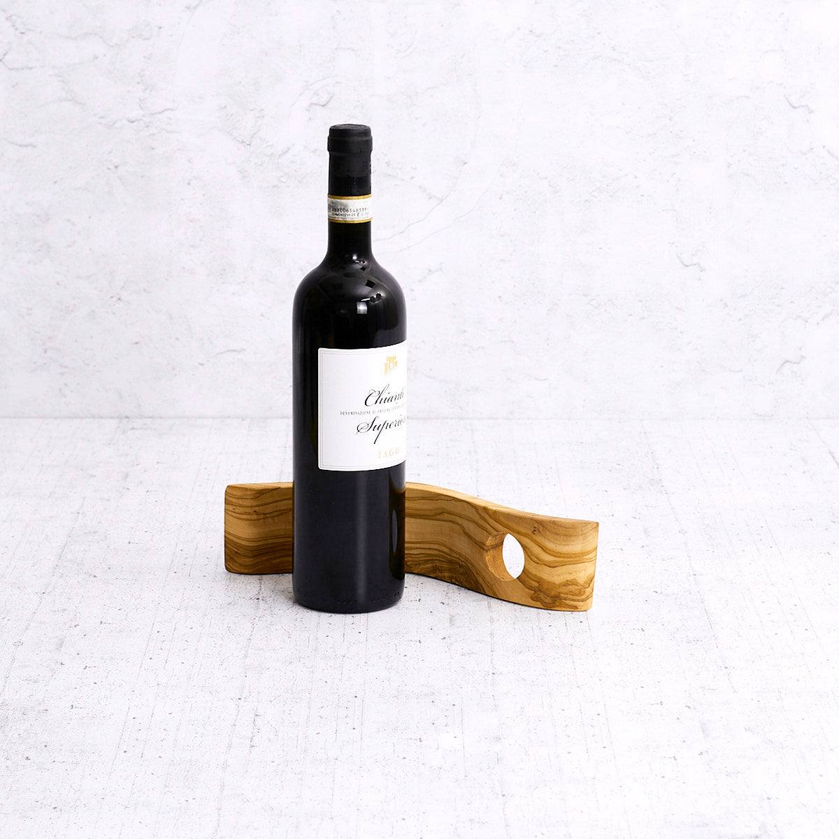 Porta bottiglia "esse" in legno di olivo