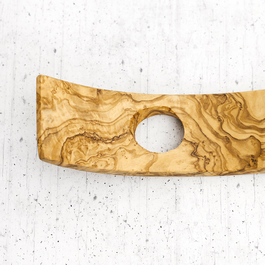 Porta bottiglia "luna curva" in legno di olivo