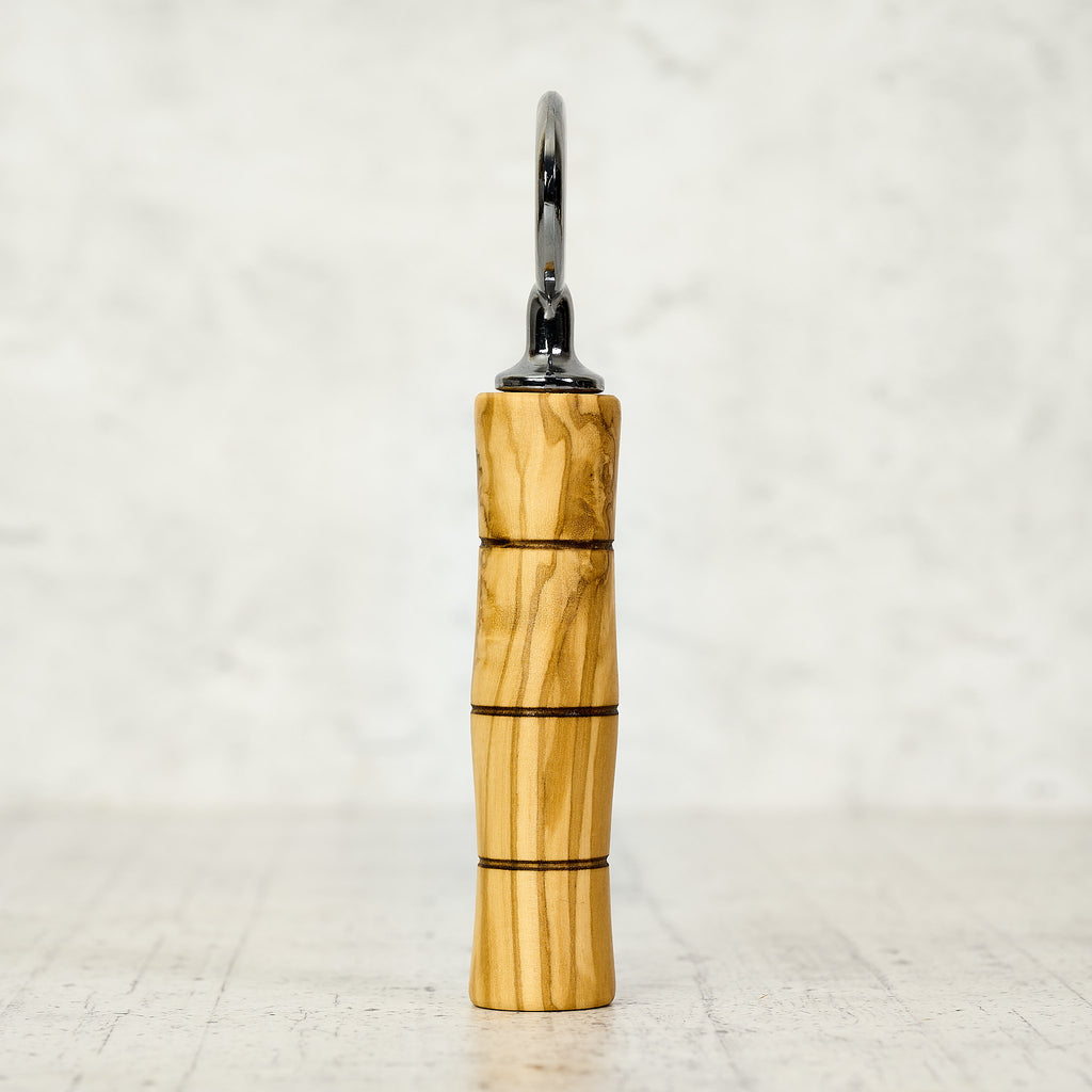 Apribottiglie con manico in legno di ulivo