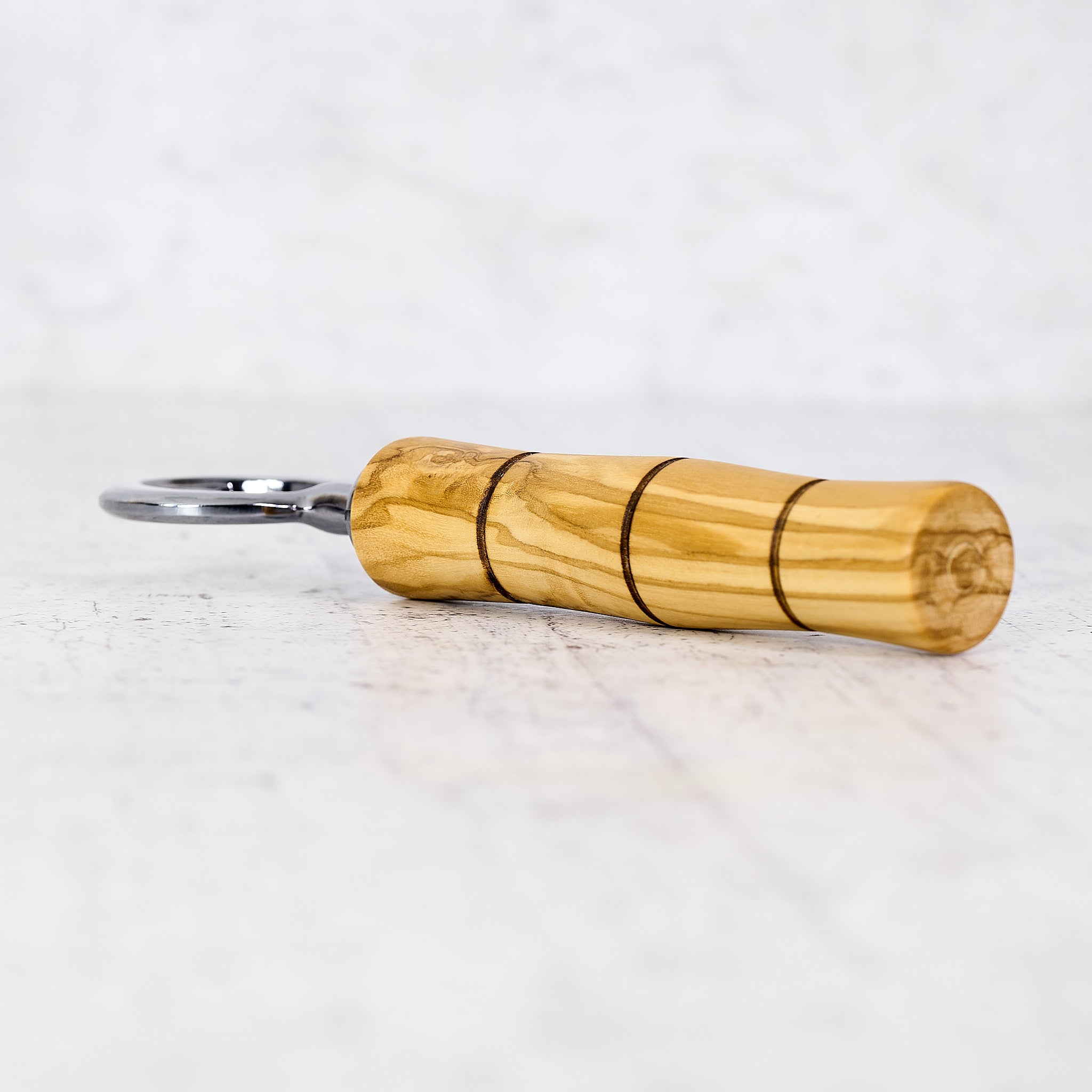 Apribottiglie con manico in legno di ulivo