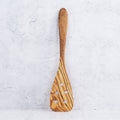 Spatola con fori in legno di olivo