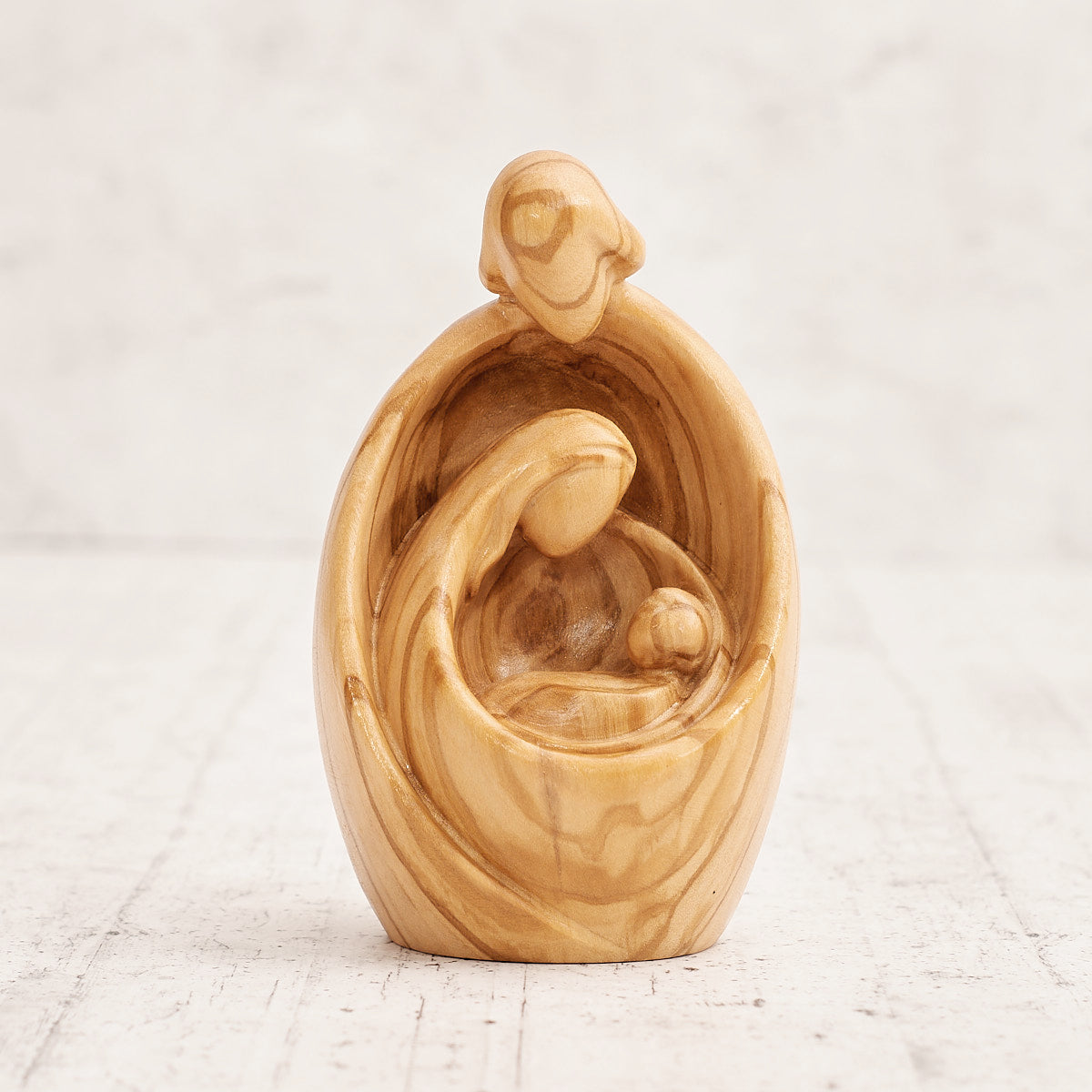 Sacra Famiglia bombata - legno d’ulivo lavorato a mano