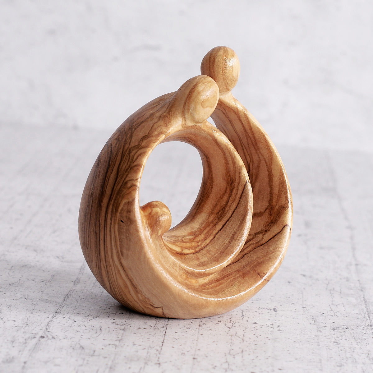 Sacra famiglia tonda in legno d'ulivo - regalo artigianale
