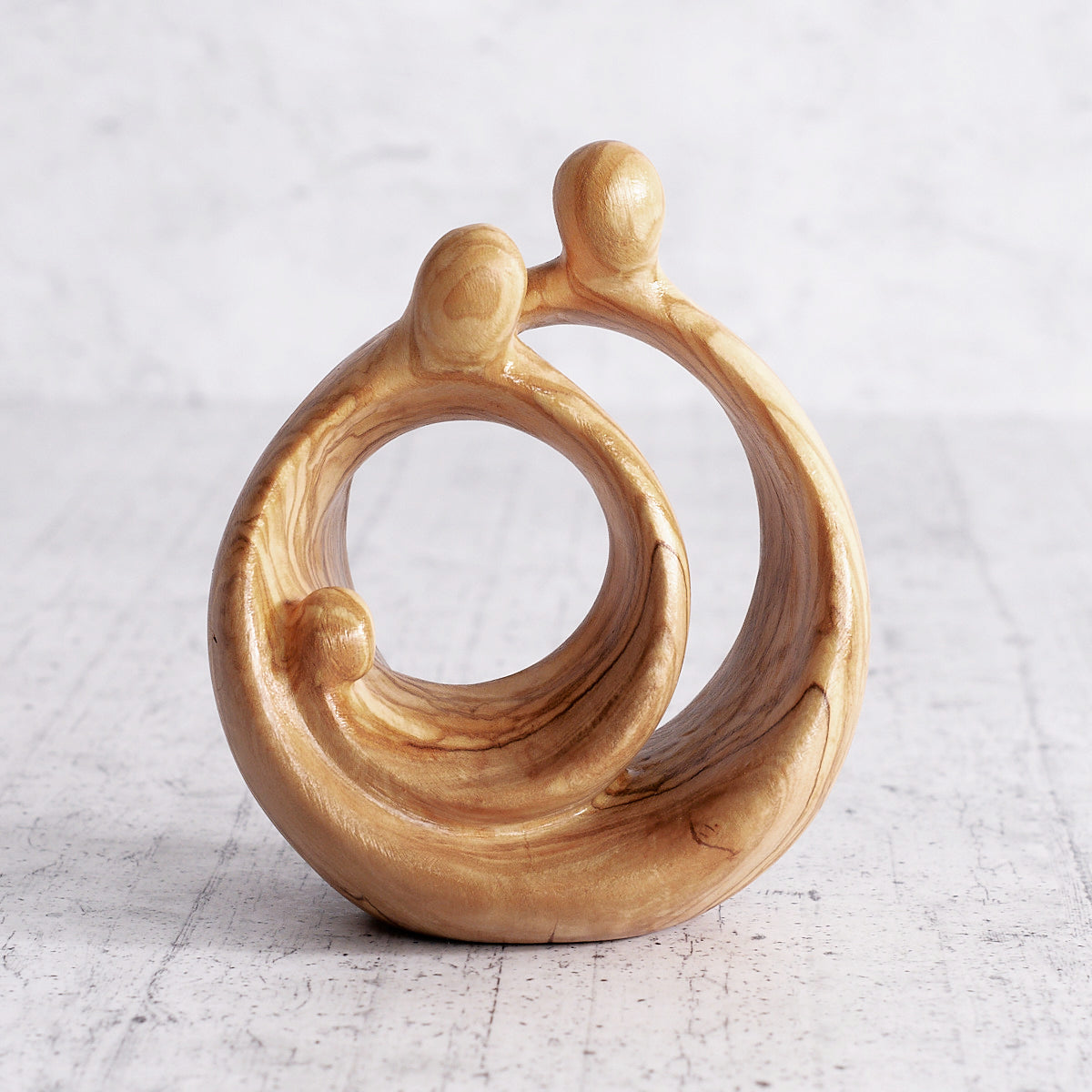 Sacra famiglia tonda in legno d'ulivo - regalo artigianale