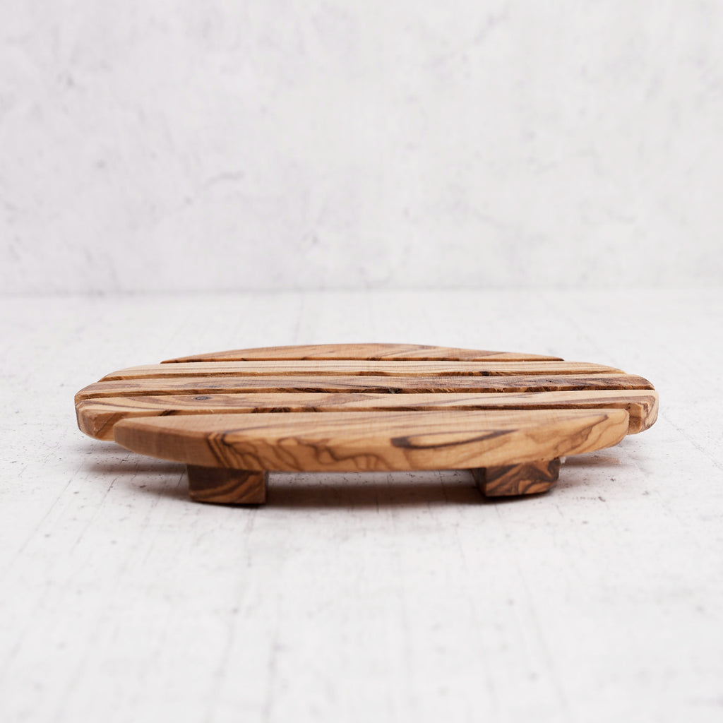 Sotto pentola rotondo in legno di olivo