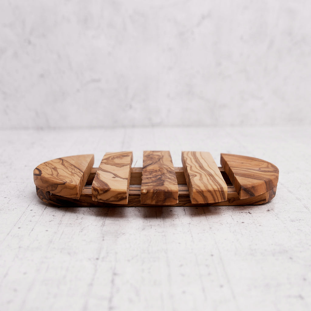 Sotto pentola rotondo in legno di olivo