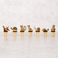 Olive wood and cork animal stoppers
