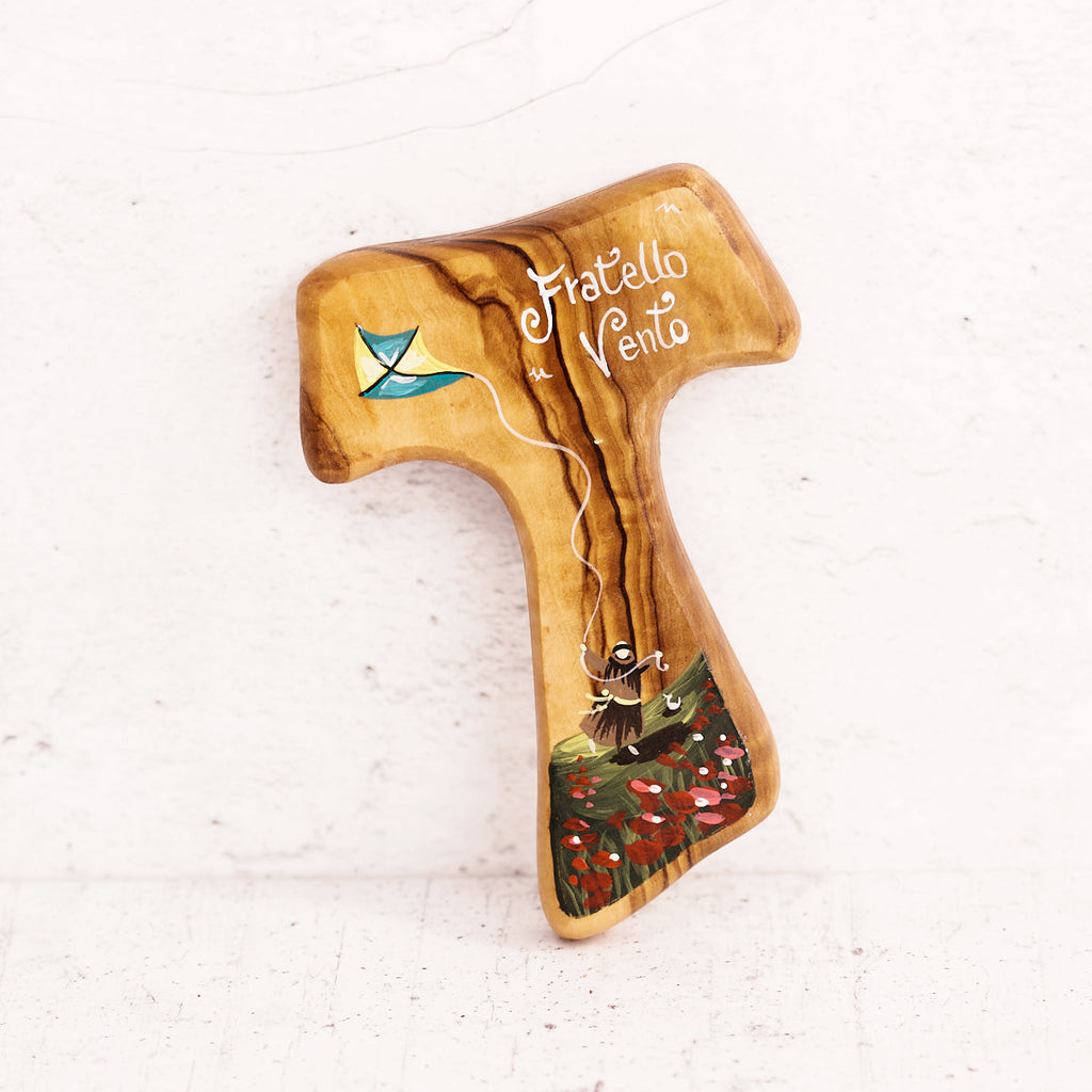 Tau Fratello vento dipinto a mano su legno di olivo